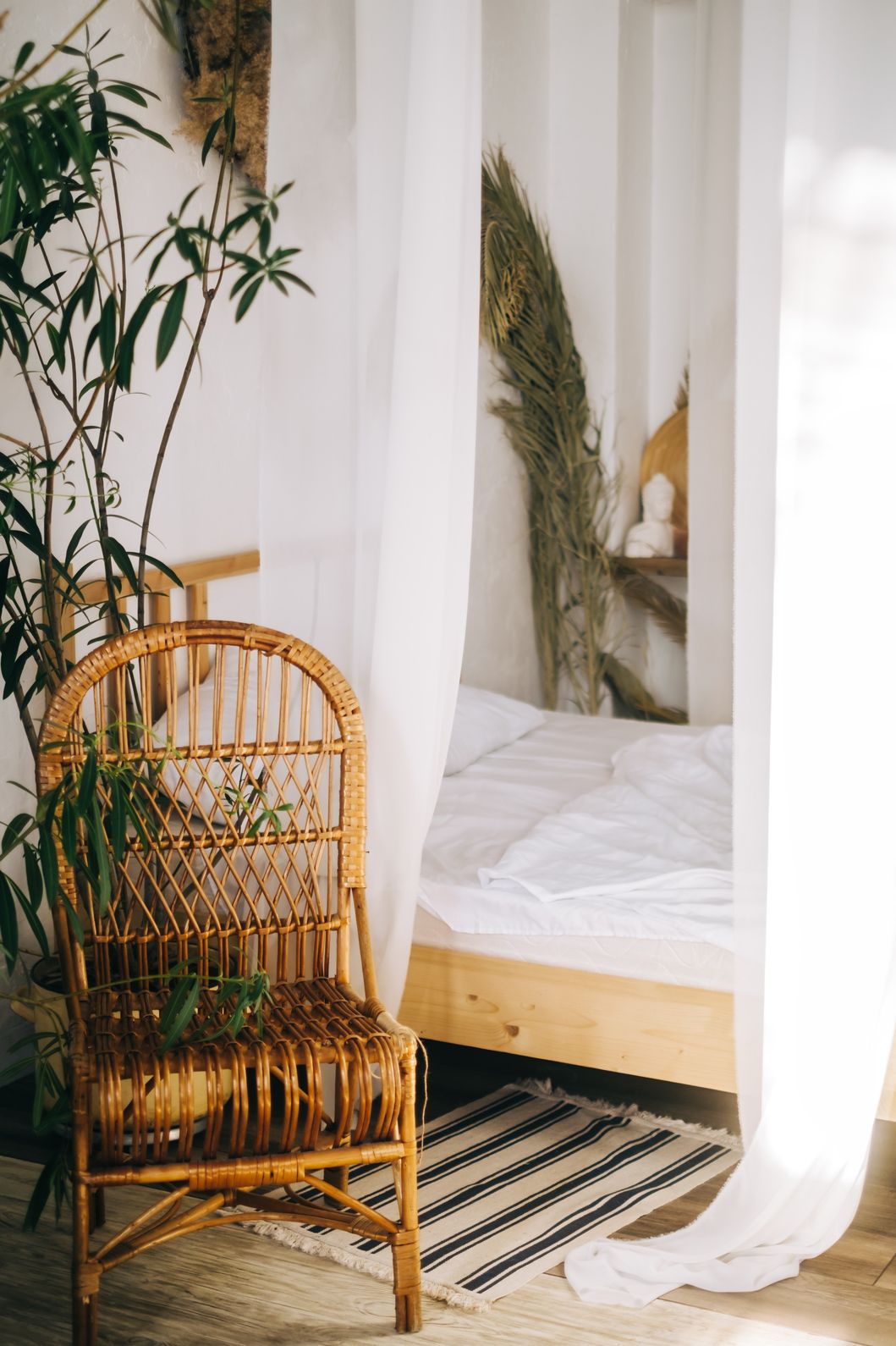 interior-of-bright-bedroom-in-eco-style-with-big-b-G2X2WBS.jpg